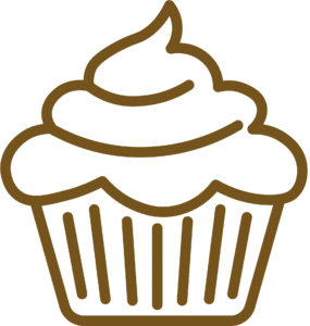 Cupcake with swirled frosting on top in a ridged cupcake liner.